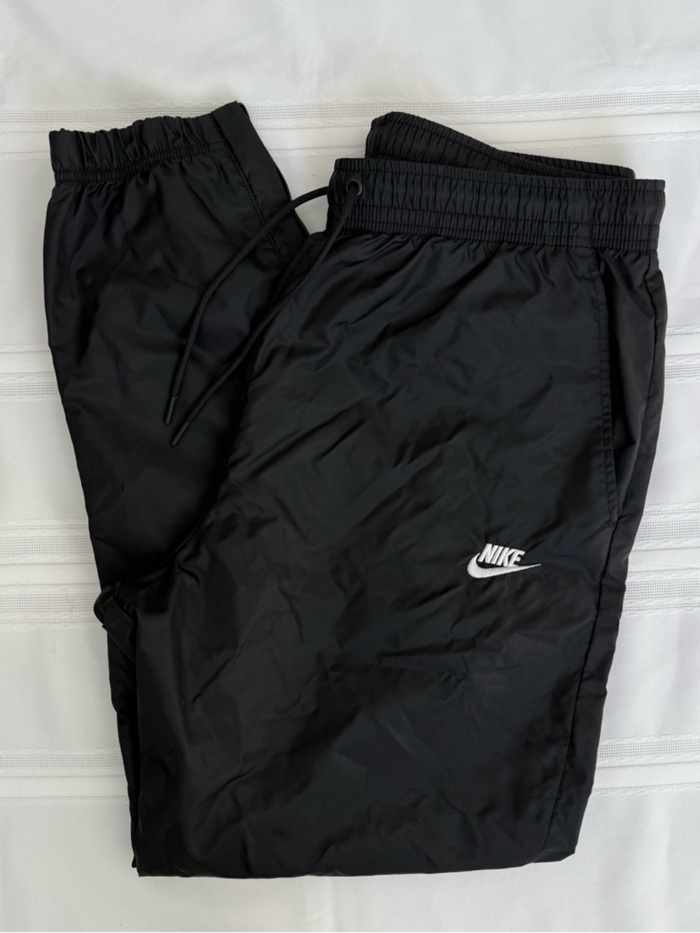 Nike Black Track Pants with White Swoosh Logo